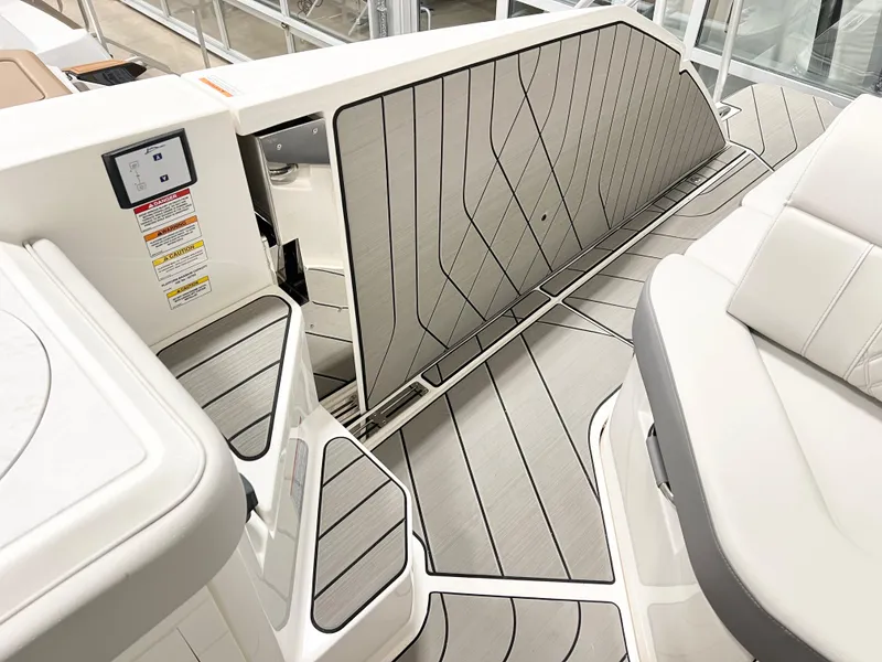 Slide: The Image of 2025 Sea Ray SLX 400 boat interior with sleek, modern design and comfortable seating. - 4