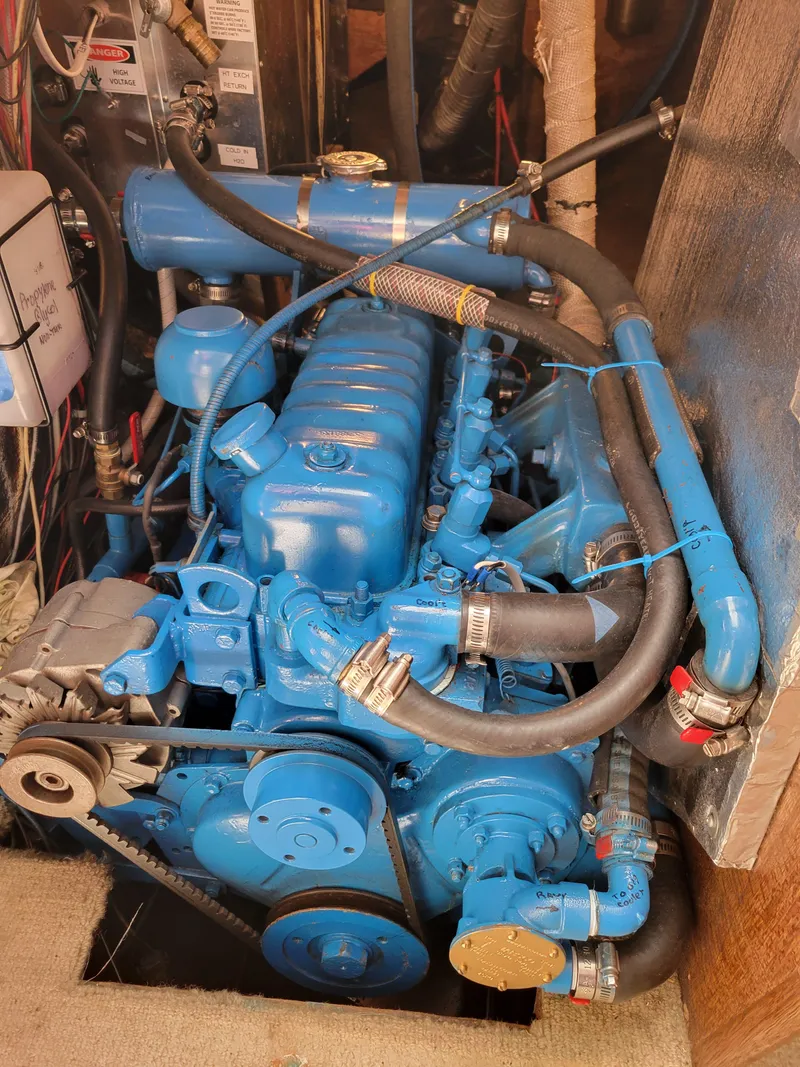 Slide: The Image of Blue Spencer 42 engine from 1967 in a mechanical room. - 28