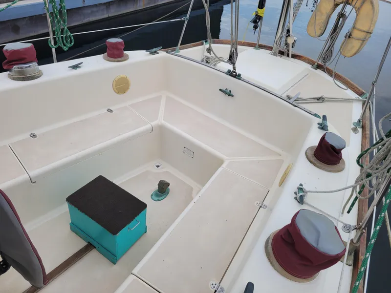 Slide: The Image of 1967 Spencer 42 sailboat cockpit with seating and nautical equipment. - 41