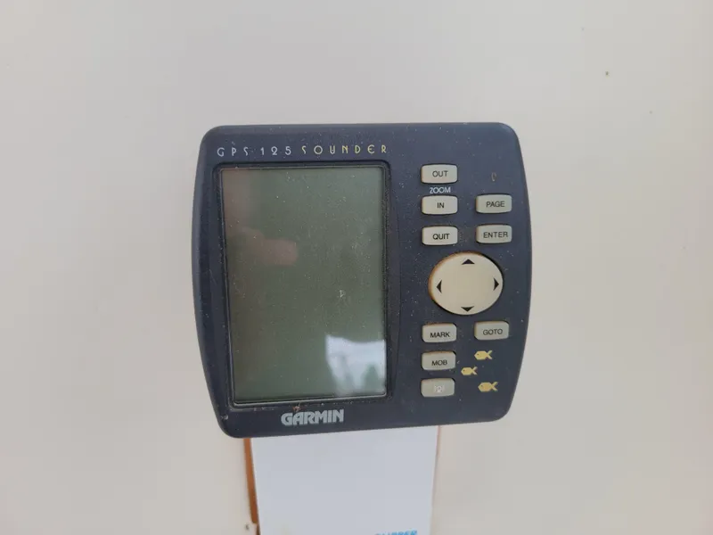 Slide: The Image of Garmin GPS 125 Sounder device on Spencer 42, 1967 model boat. - 47
