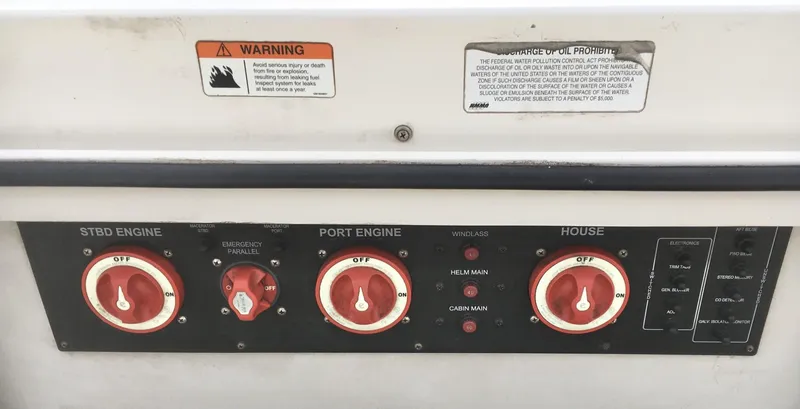 Slide: The Image of Control panel of a 2006 Seaswirl Striper 2901 Walkaround O/B boat with warning labels. - 11