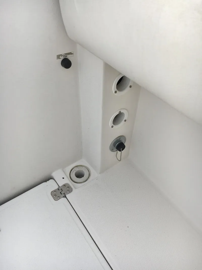 Slide: The Image of 2006 Seaswirl Striper 2901 Walkaround O/B interior detail with storage and utility features. - 19