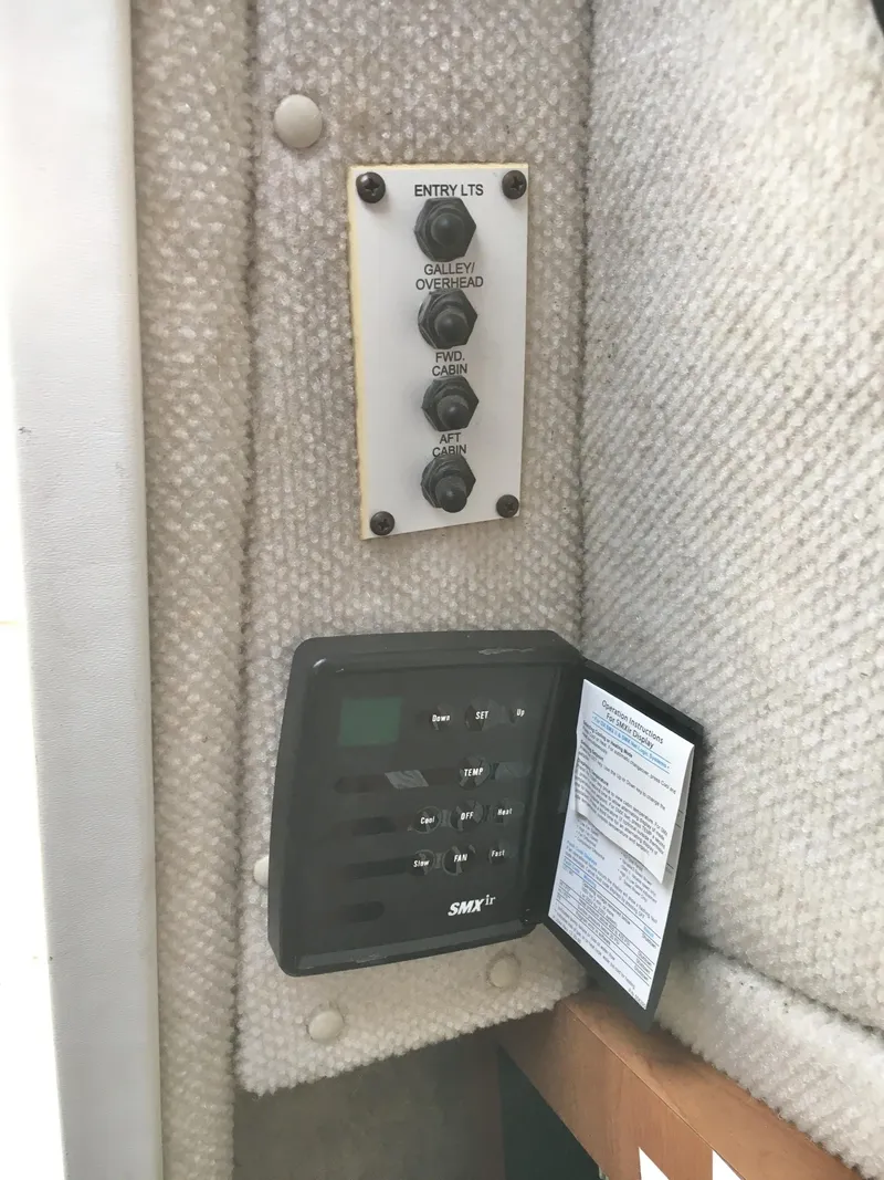 Slide: The Image of Control panel on a 2006 Seaswirl Striper 2901 Walkaround O/B boat interior. - 29