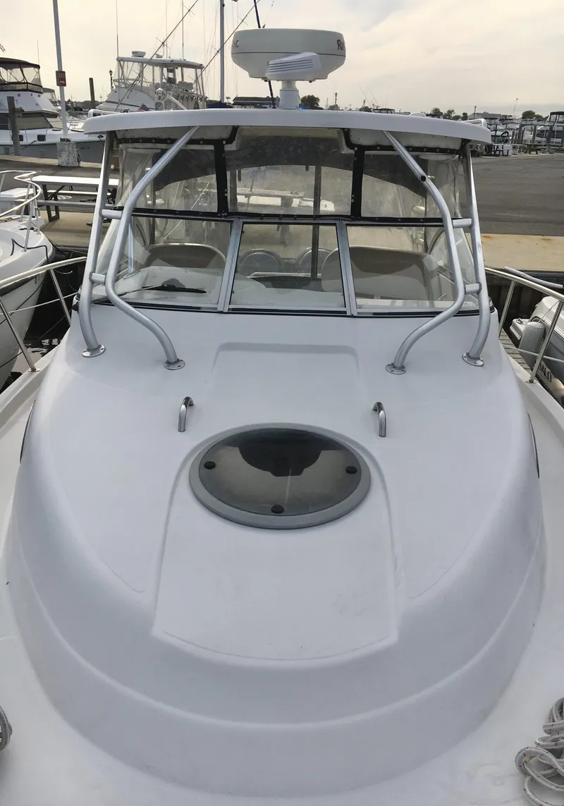 Slide: The Image of 2006 Seaswirl Striper 2901 Walkaround O/B boat with sleek design and spacious deck. - 3