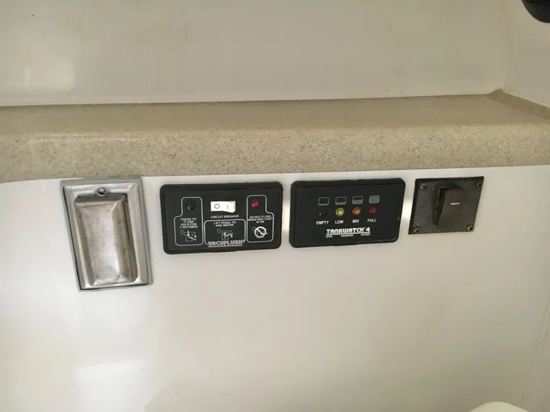 Slide: The Image of Control panel on 2006 Seaswirl Striper 2901 Walkaround O/B boat interior. - 36