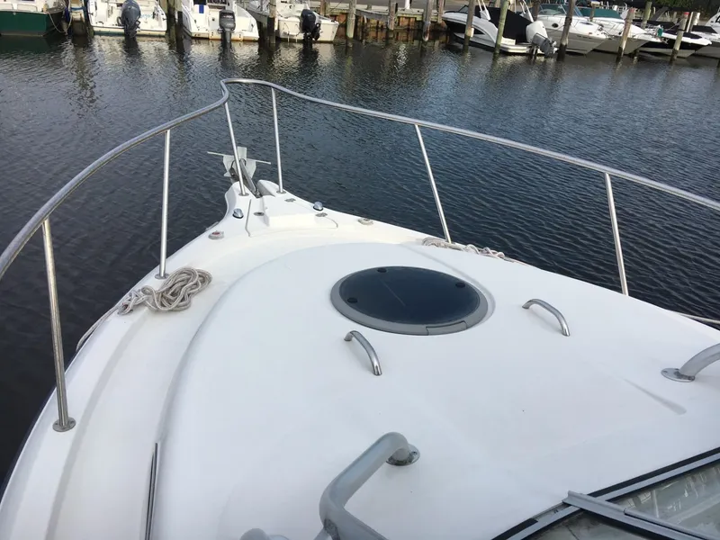 Slide: The Image of 2006 Seaswirl Striper 2901 Walkaround O/B boat docked at marina. - 4