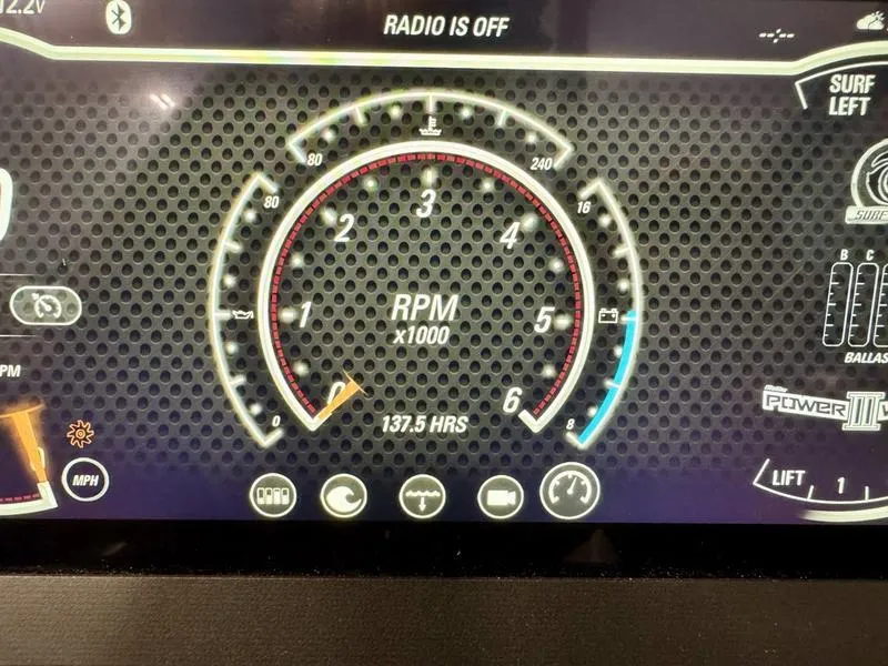Slide: The Image of Dashboard of 2021 Malibu 25 LSV showing RPM gauge and 137.5 hours logged. - 17