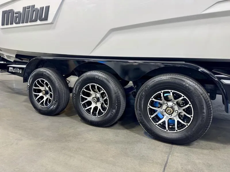 Slide: The Image of 2021 Malibu 25 LSV boat trailer with triple axle wheels. - 8