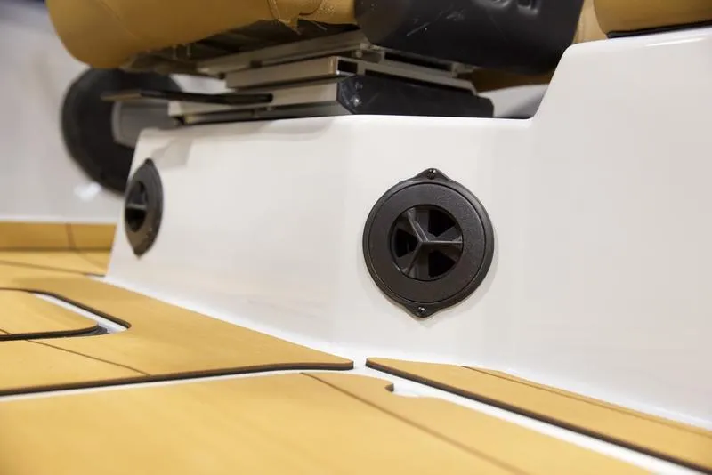 Slide: The Image of 2024 Axis A245 boat interior with sleek seating and integrated speakers. - 16