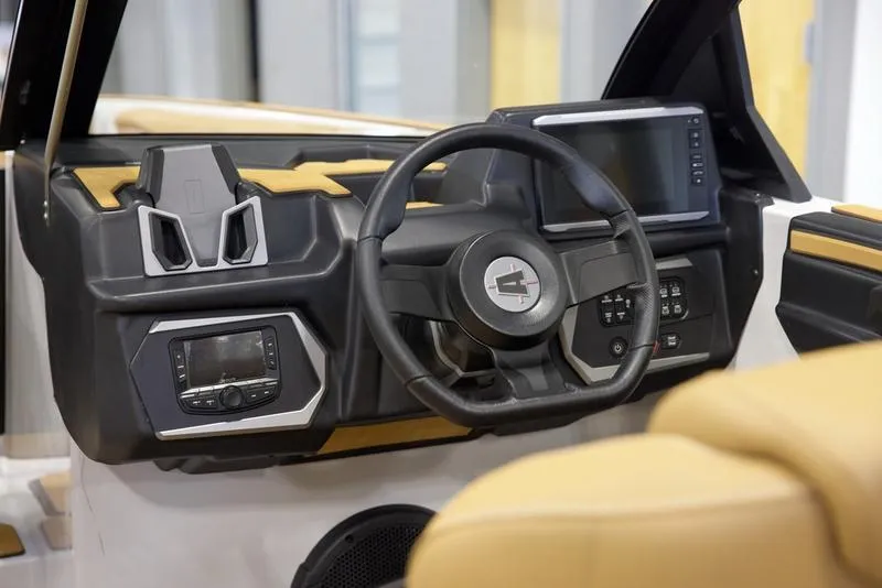 Slide: The Image of 2024 Axis A245 boat dashboard with modern steering wheel and digital display. - 5