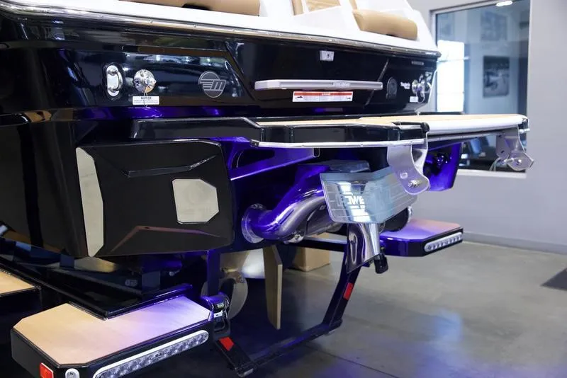 Slide: The Image of 2025 Malibu 26 LSV boat rear view with advanced features and sleek design. - 7