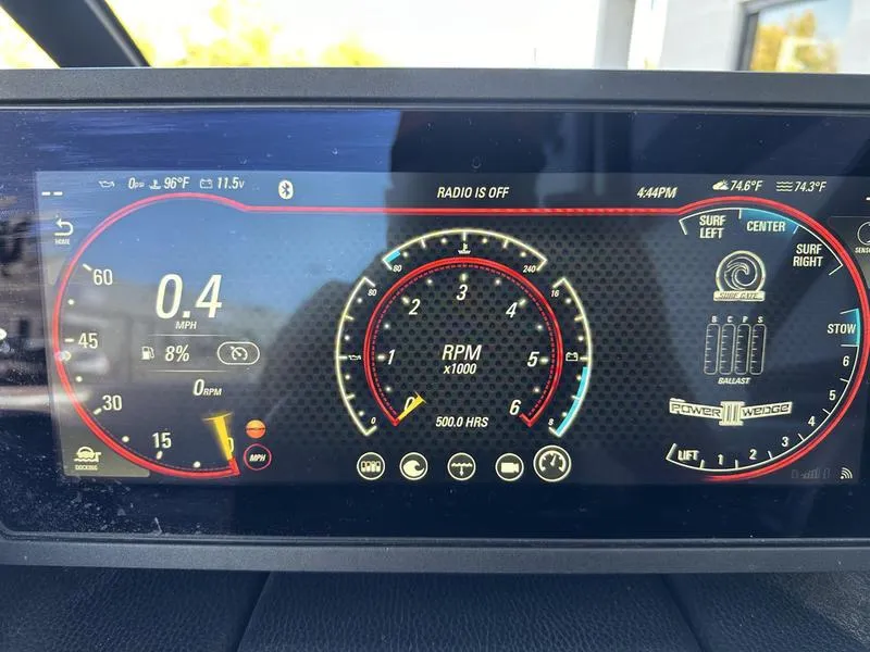 Slide: The Image of Dashboard of a 2020 Malibu 22 MXZ boat showing RPM and speed. - 16