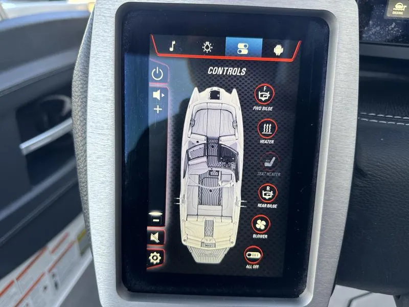 Slide: The Image of Touchscreen control panel of 2020 Malibu 22 MXZ boat displaying various settings. - 17