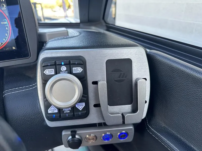 Slide: The Image of 2020 Malibu 22 MXZ dashboard controls with sleek design and modern features. - 18