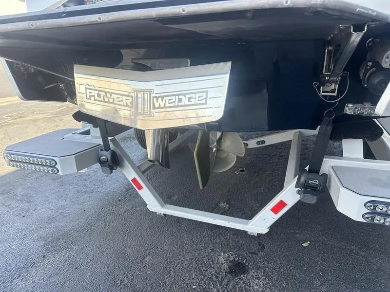Slide: The Image of 2020 Malibu 22 MXZ boat with Power Wedge III, rear view. - 6