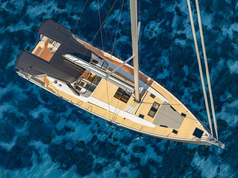 Slide: The Image of Aerial view of 2025 Hanse 590 yacht sailing on clear blue water. - 10