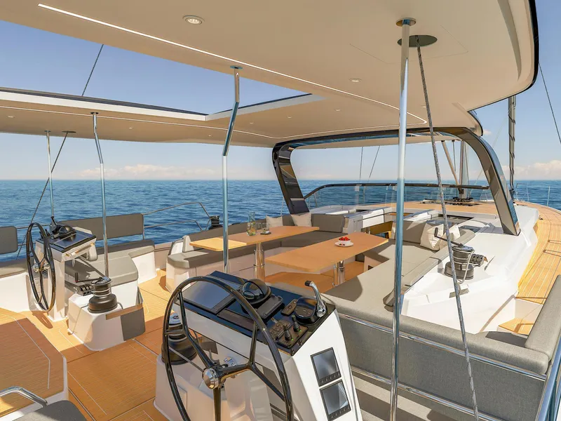 Slide: The Image of Luxurious 2025 Hanse 590 yacht deck with modern steering and seating, sailing on open sea. - 12