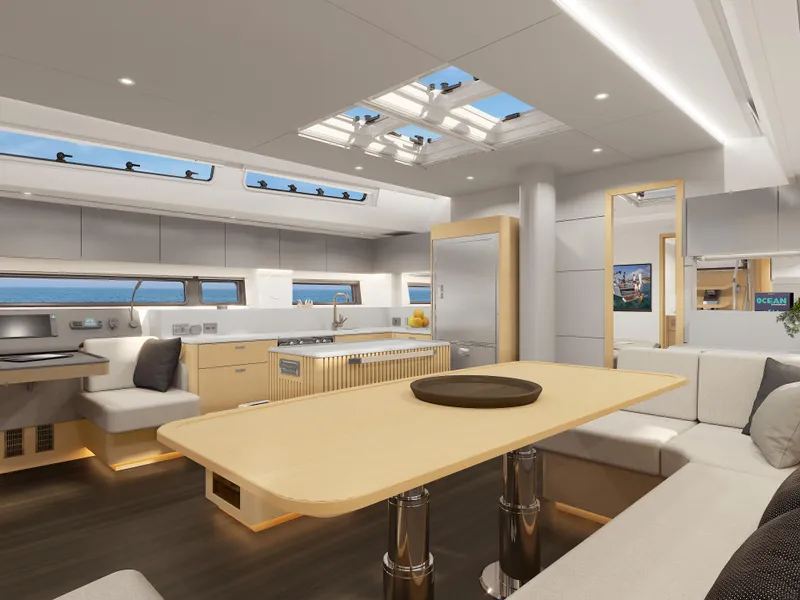Slide: The Image of Luxurious interior of 2025 Hanse 590 yacht with modern kitchen and seating area. - 28
