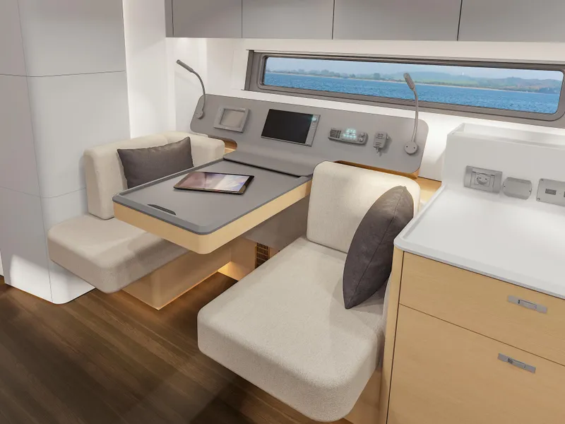 Slide: The Image of Modern interior of 2025 Hanse 590 yacht with sleek seating and navigation equipment. - 29