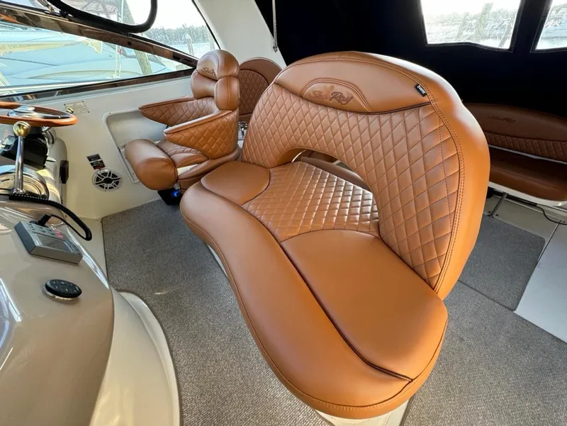 Slide: The Image of Luxurious leather seating in 2002 Sea Ray 380 Sundancer yacht interior. - 2