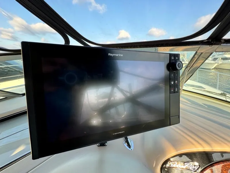 Slide: The Image of Raymarine navigation display on 2002 Sea Ray 380 Sundancer yacht dashboard. - 7
