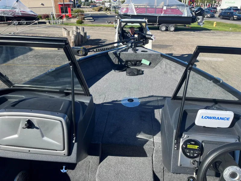 Slide: The Image of 2025 Tracker Pro Guide V-175 Combo boat interior with Lowrance electronics. - 3