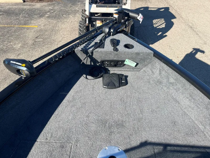 Slide: The Image of 2025 Tracker Pro Guide V-175 Combo boat deck with trolling motor and control panel. - 4