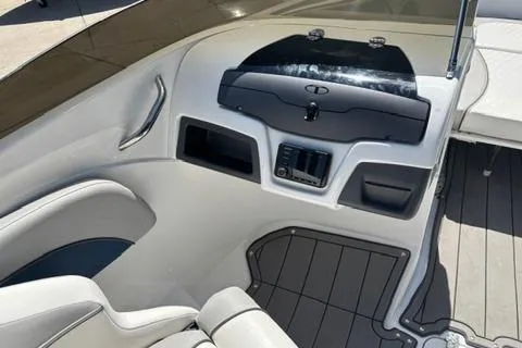 Slide: The Image of 2024 Tahoe 210 Si Limited boat interior with sleek dashboard and modern controls. - 12