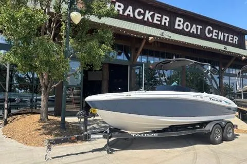 Slide: The Image of 2024 Tahoe 210 Si Limited boat on trailer at Tracker Boat Center. - 1
