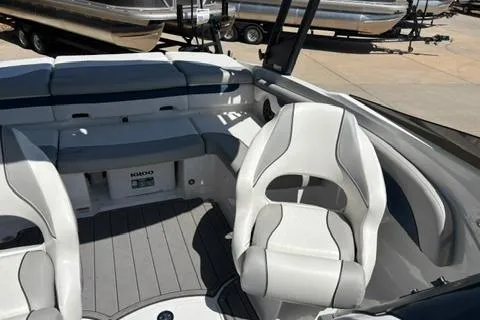 Slide: The Image of 2024 Tahoe 210 Si Limited boat interior with sleek seating and modern design. - 8