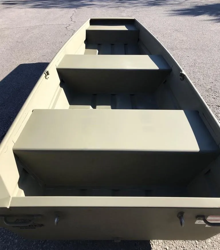 Slide: The Image of 2025 Tracker Grizzly 1236 Utility boat, olive green, empty interior view. - 4