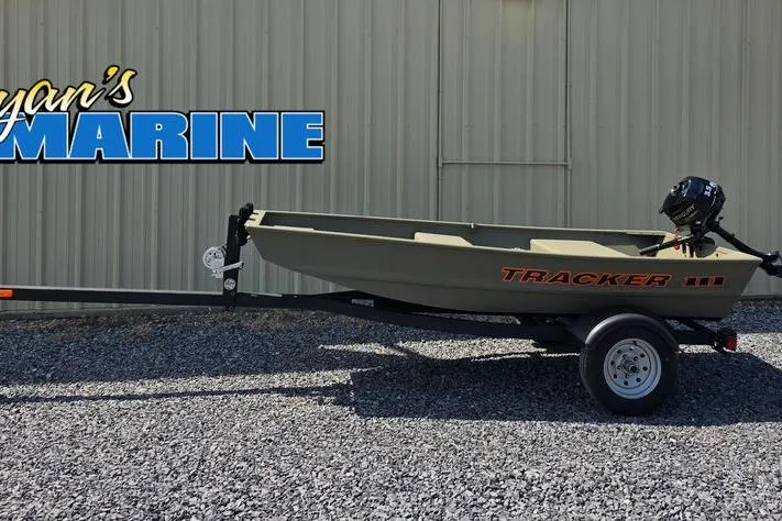 The Image of 2025 Tracker Grizzly 10 Jon boat on trailer, displayed outside marine shop. - 0
