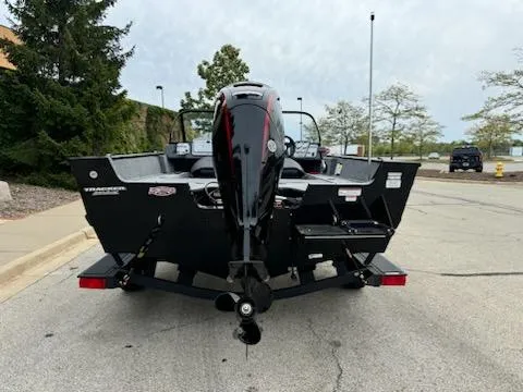 Slide: The Image of 2025 Tracker Pro Guide V-175 Combo boat, rear view in parking lot. - 5