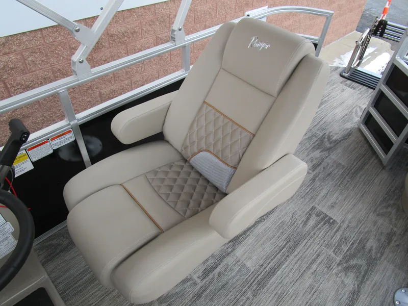 Slide: The Image of 2024 Ranger Reata 223C boat seat with beige upholstery and diamond stitching. - 20