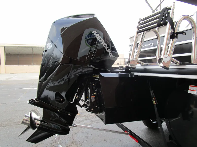 Slide: The Image of 2024 Ranger Reata 223C boat with Mercury outboard motor, rear view. - 8