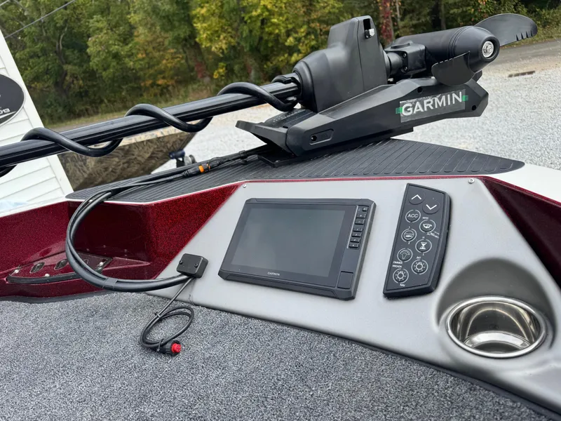 Slide: The Image of 2025 Ranger 620FS boat dashboard with Garmin equipment and control panel. - 7