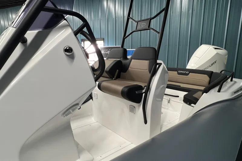 Slide: The Image of 2025 Grand G680 boat interior with steering wheel and seating, featuring modern design. - 1