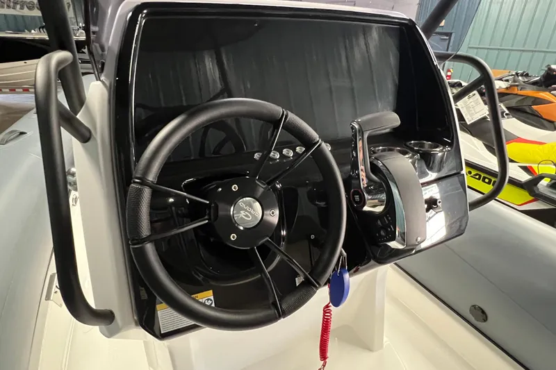 Slide: The Image of Steering console of 2025 Grand G680 boat with modern controls and sleek design. - 3