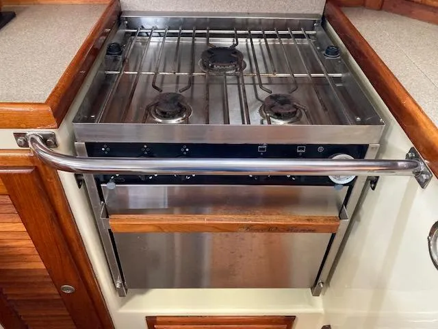 Slide: The Image of Stainless steel stove in 1997 Pacific Seacraft 40 yacht kitchen. - 23