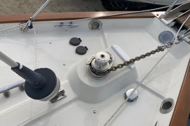 Slide: The Image of Deck of 1997 Pacific Seacraft 40 sailboat with anchor chain and winch. - 9