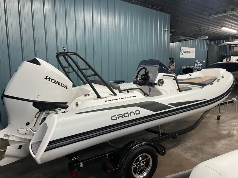 The Image of 2025 Grand G500HLF boat with Honda engine in a showroom. - 0