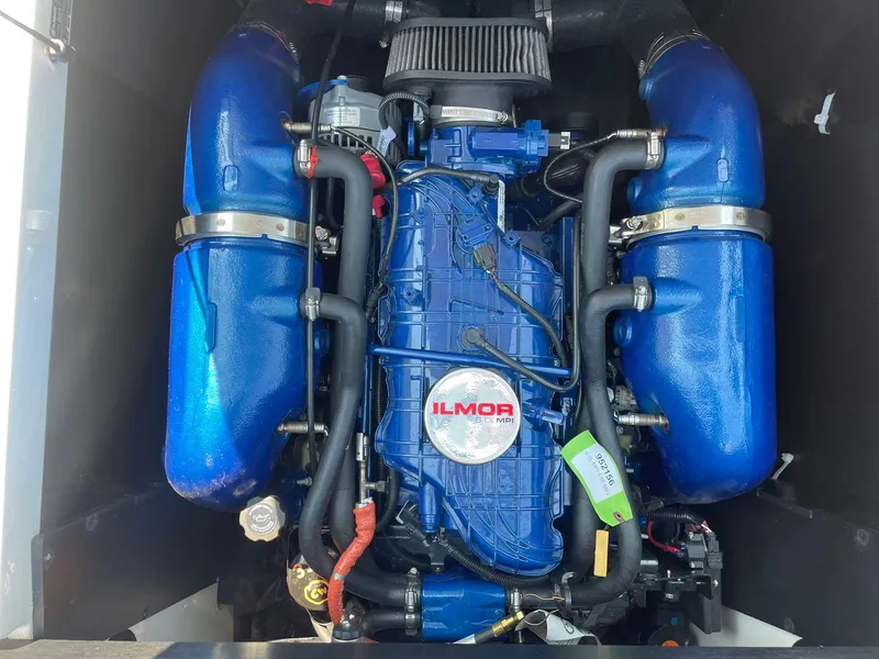 Slide: The Image of 2021 MasterCraft NXT 24 engine with blue Ilmor components. - 15