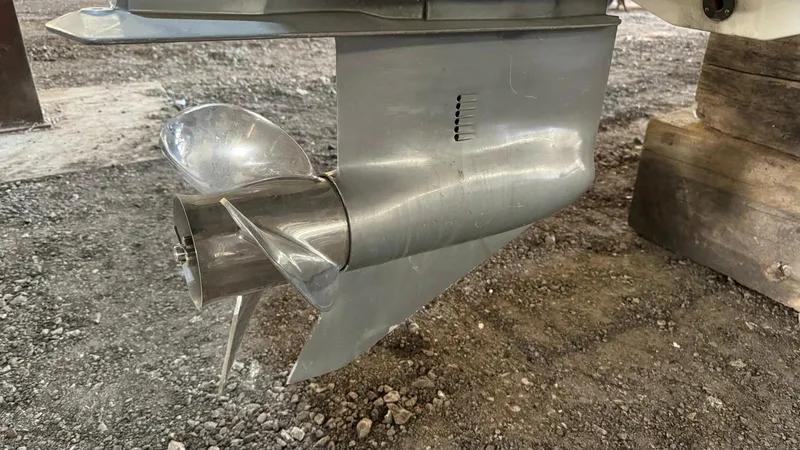 Slide: The Image of Propeller of a 2006 Chris-Craft Speedster boat on gravel surface. - 13