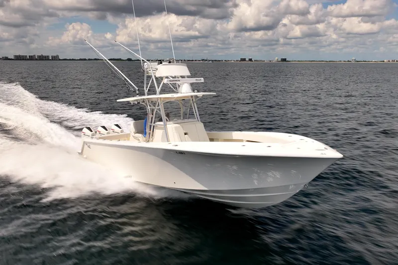 The Image of 2020 SeaVee 370z boat on open water under cloudy sky. - 0