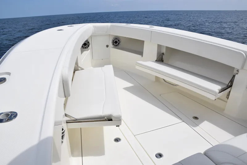 Slide: The Image of 2020 SeaVee 370z boat interior with white seating and ocean view. - 11