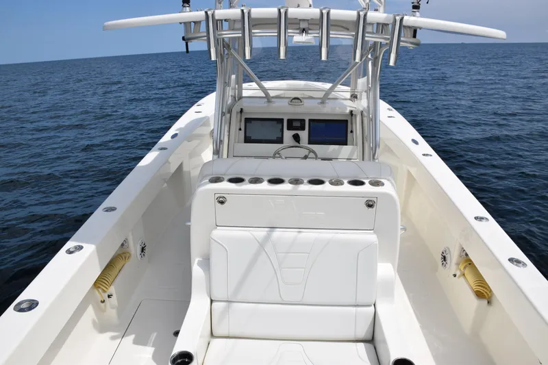 Slide: The Image of 2020 SeaVee 370z boat with center console on open water. - 31