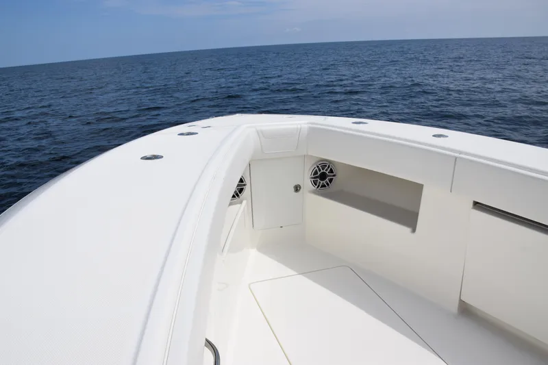 Slide: The Image of 2020 SeaVee 370z boat bow with ocean view, featuring sleek white design. - 8