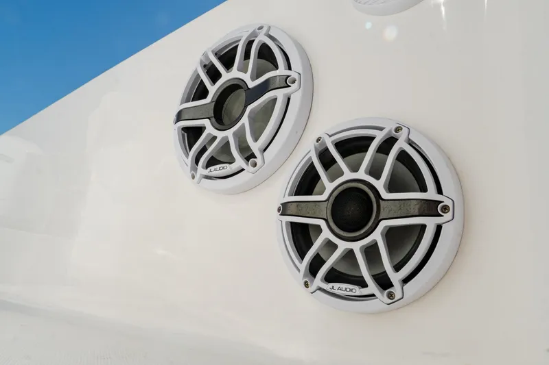 Slide: The Image of 2024 Blackwater 23 Hybrid boat speakers against a clear blue sky. - 14