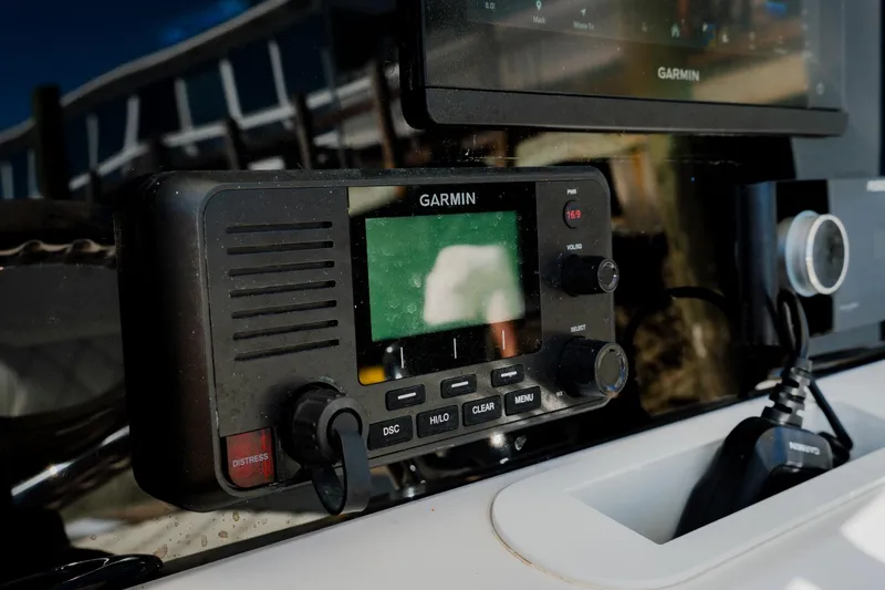 Slide: The Image of Garmin marine radio on 2024 Blackwater 23 Hybrid boat dashboard. - 23