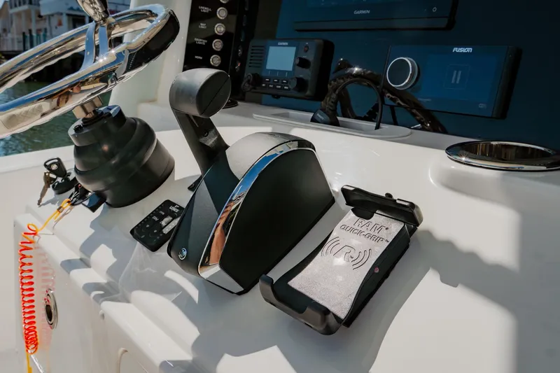 Slide: The Image of 2024 Blackwater 23 Hybrid boat controls and dashboard with modern navigation equipment. - 26